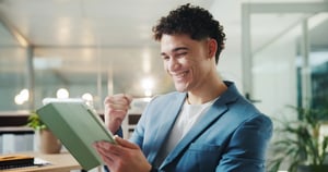 vecteezy_business-tablet-and-man-in-office-celebration-and-smile_77594508