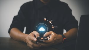 vecteezy_hand-holding-virtual-cloud-computing-with-world-and_8428171